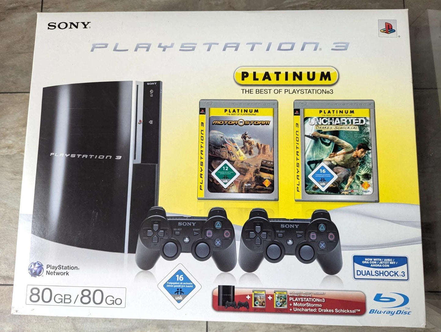 PlayStation 3 System 80GB [Platinum MotorStorm And Platinum Uncharted Bundle] - PAL Console [Import]